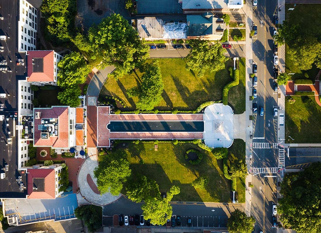 Morristown, NJ - Aerial Drone View of Buildings and Green Foliage in Downtown Morristown New Jersey on a Sunny Day